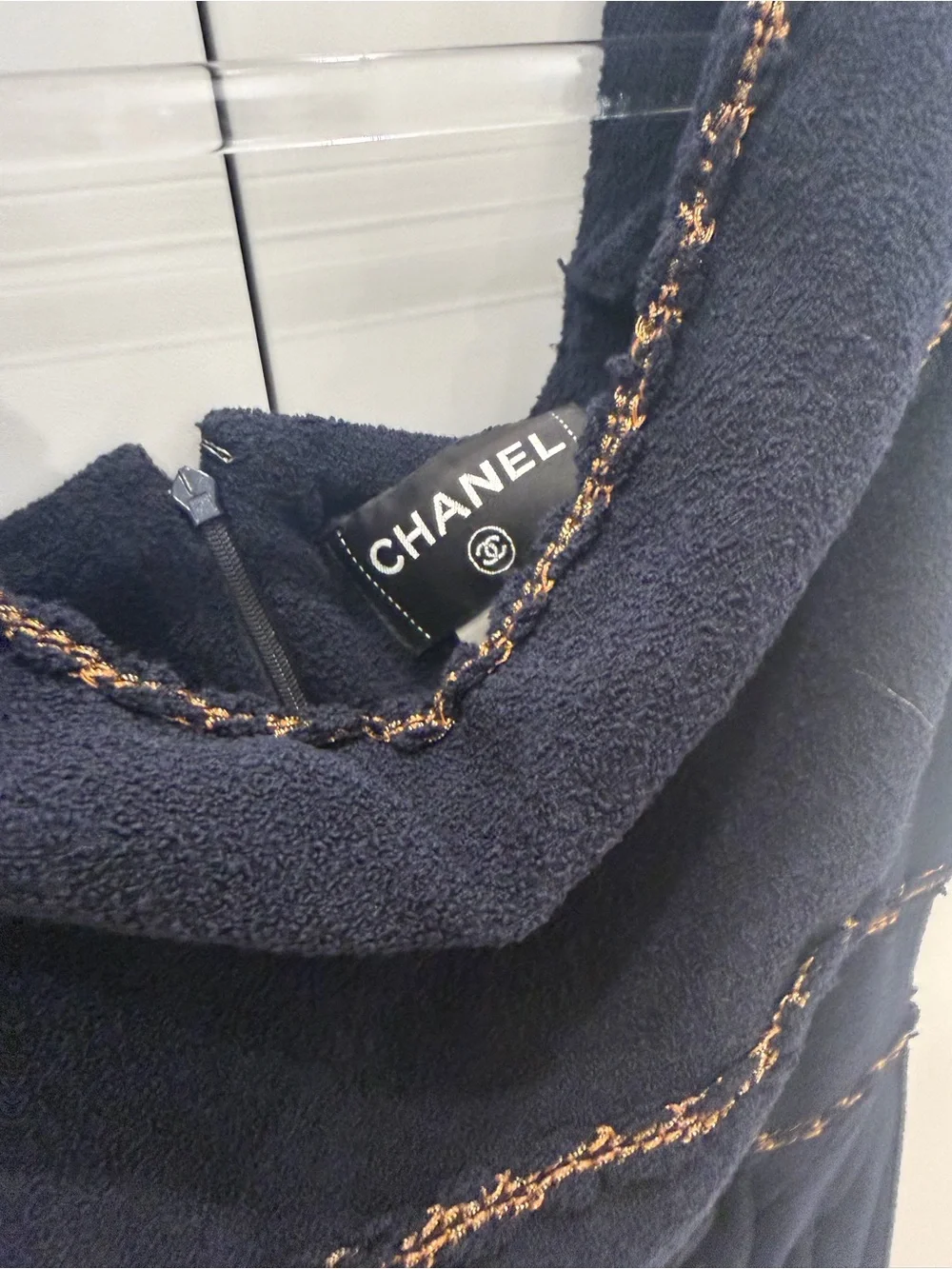 CHANEL Black Midi Dress with Gold Trim and Signature Charm